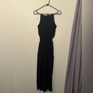 Black jumpsuit with slits and built in shorts